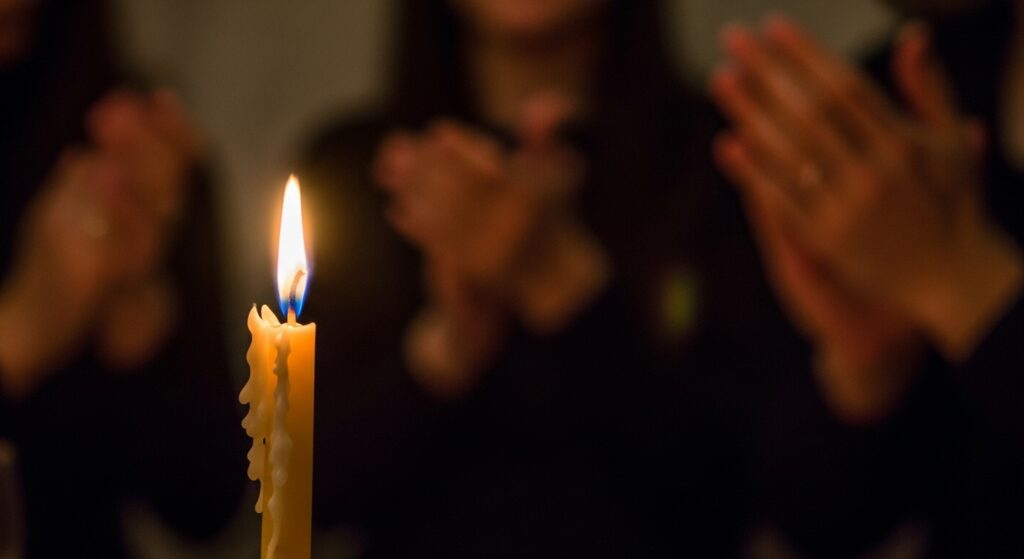 Birthday candles glowing before being blown out”